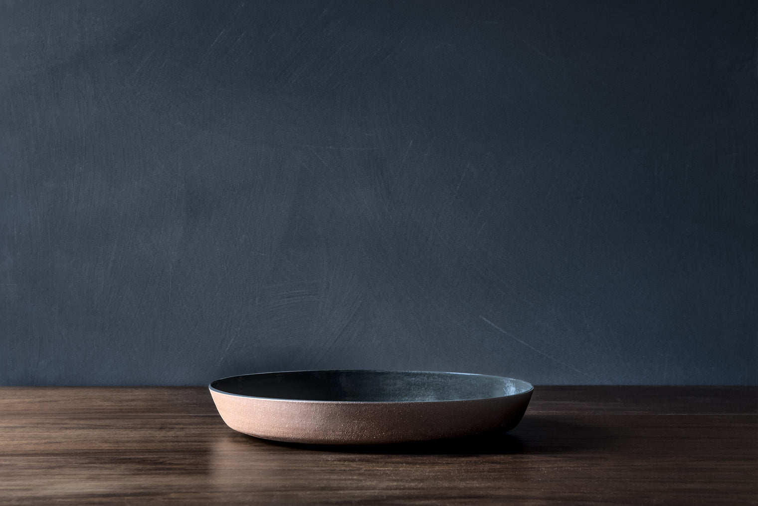 Charcoal Statement Serving Platter on Red clay